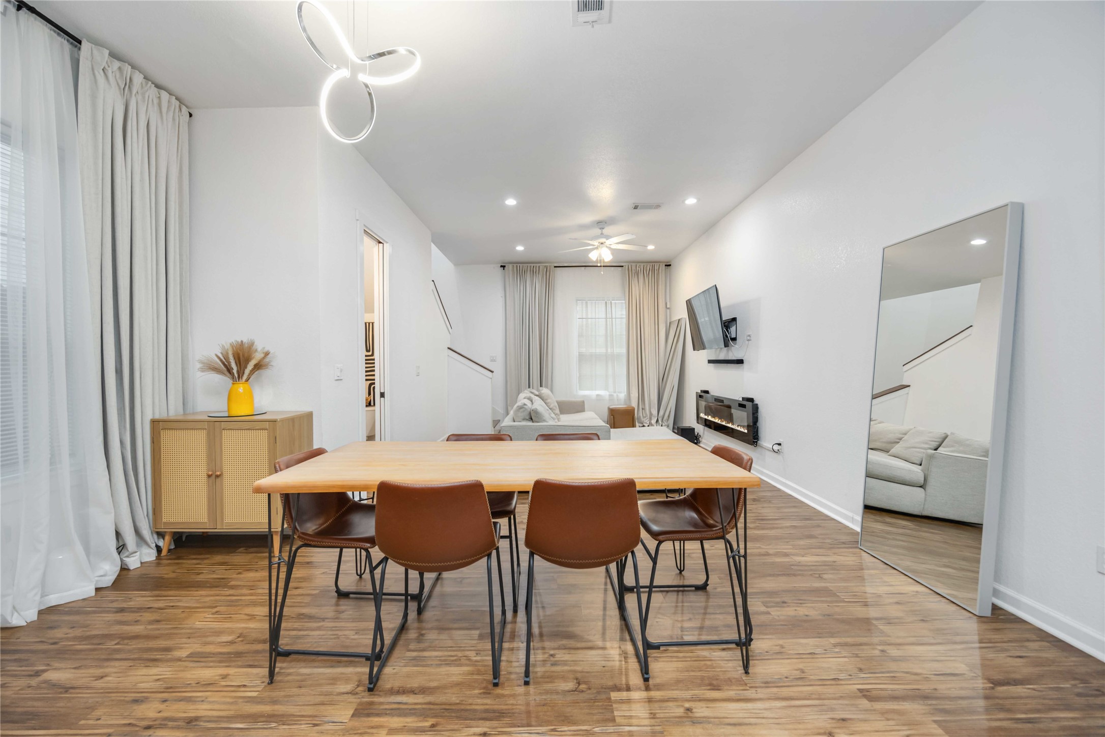 14108 Bridgeport Road, Unit B Houston, TX 77047 - Photo 7 of 24 a view of a dining room with furniture and wooden floor