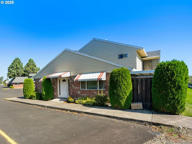 front view of a house with a street