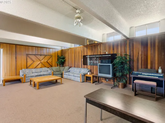 a view of a swimming pool with a lawn chairs