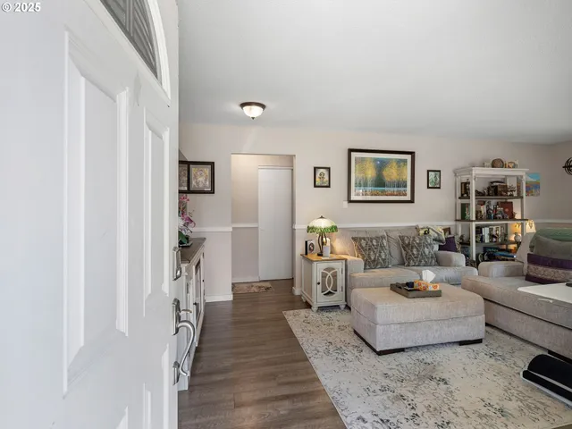a living room with furniture and a couch
