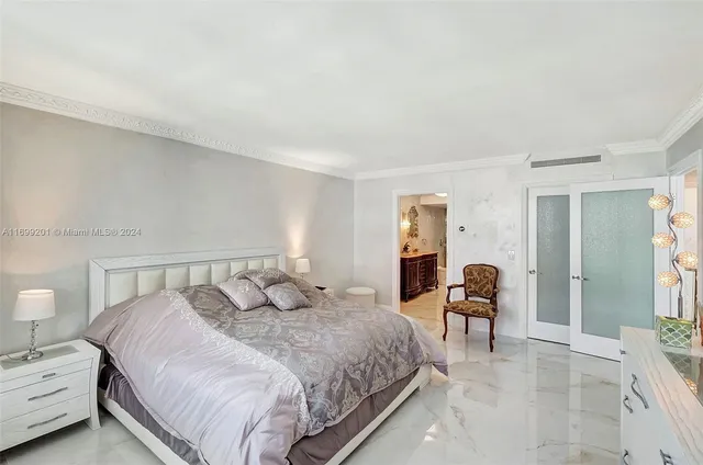 a bathroom with a sink a mirror and a shower