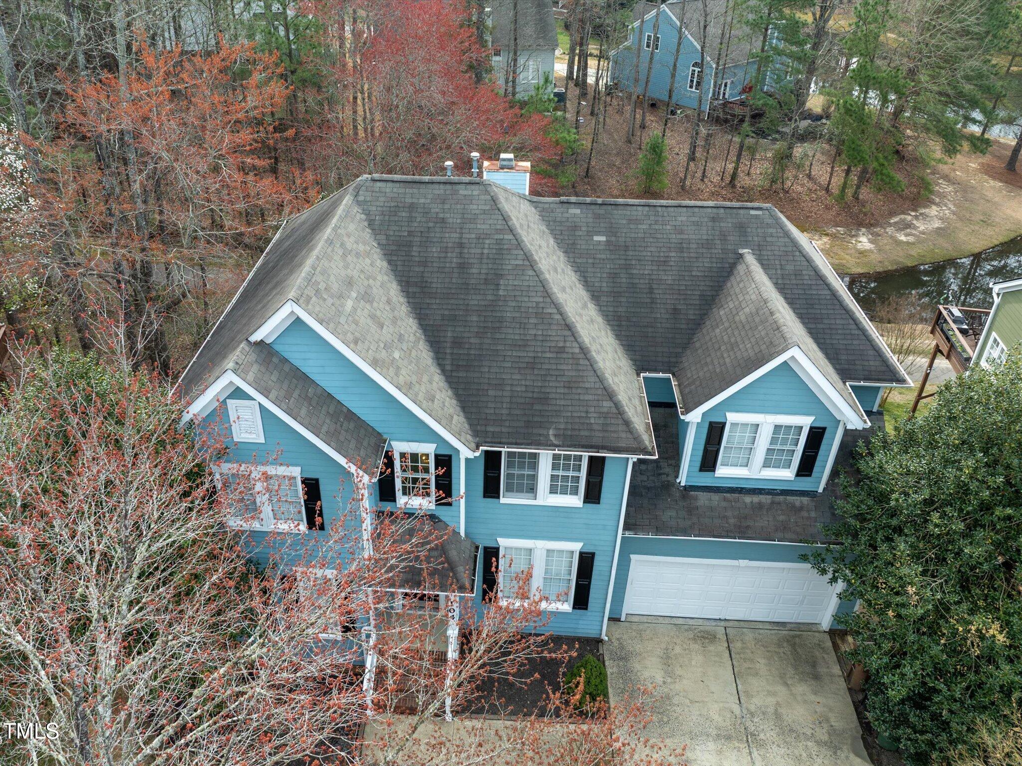 104 Deep Gap Run Cary, NC 27519 - Photo 27 of 39 a aerial view of a house with a yard