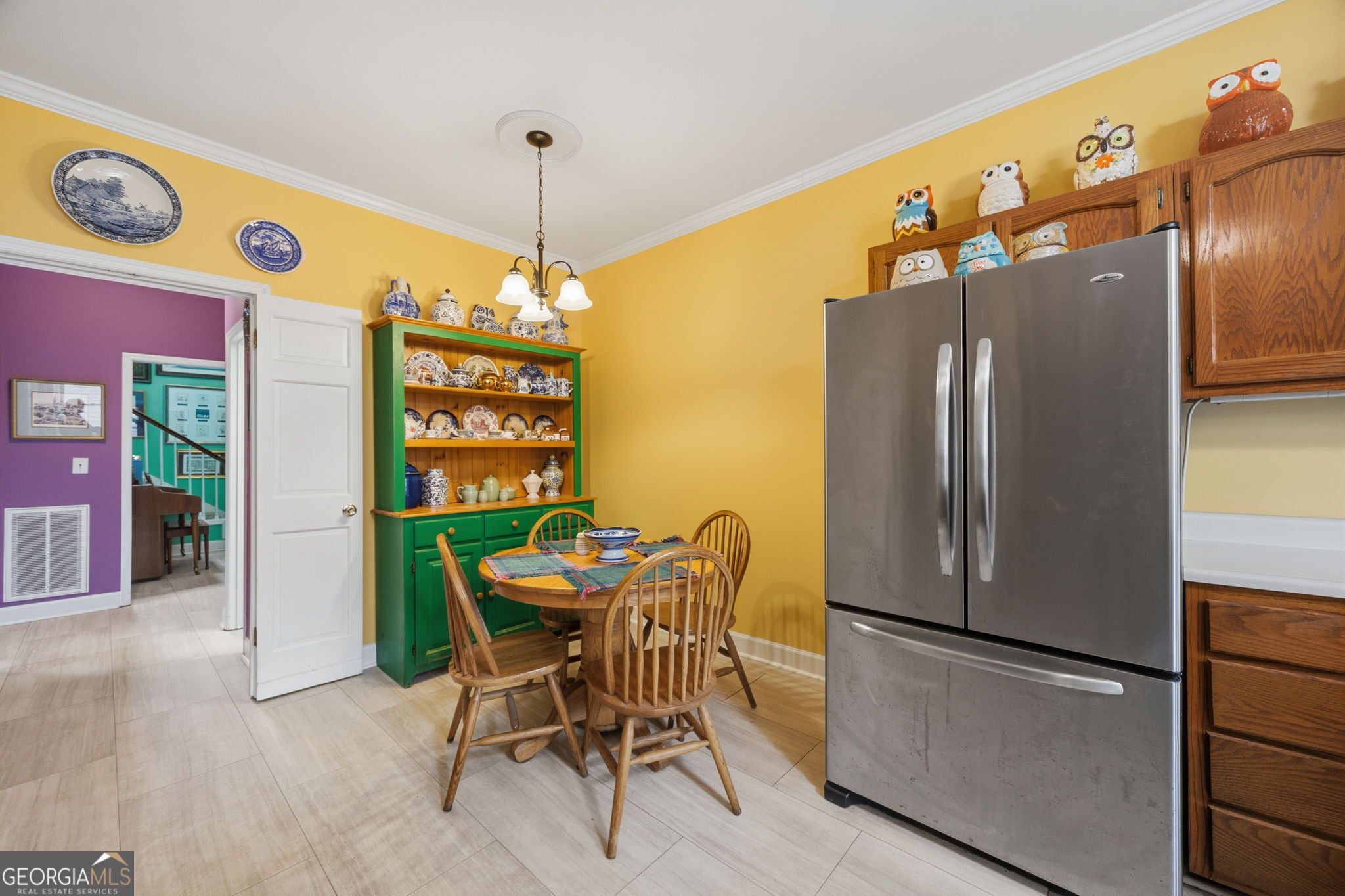 1391 Briarcliff Road, Unit 4B Macon, GA 31211 - Photo 12 of 42 a kitchen with stainless steel appliances granite countertop a refrigerator and a stove top oven