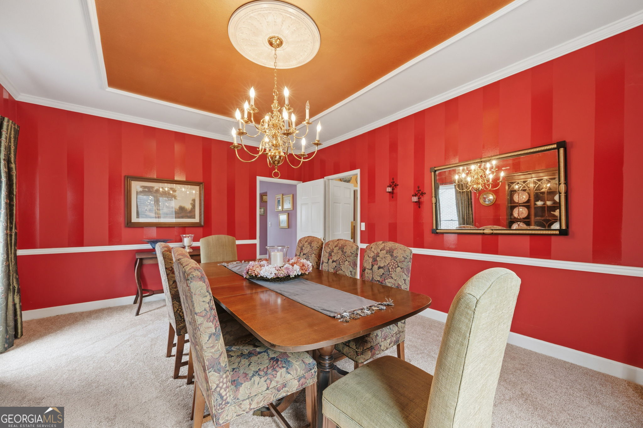 1391 Briarcliff Road, Unit 4B Macon, GA 31211 - Photo 17 of 42 a view of a dining room with furniture and chandelier
