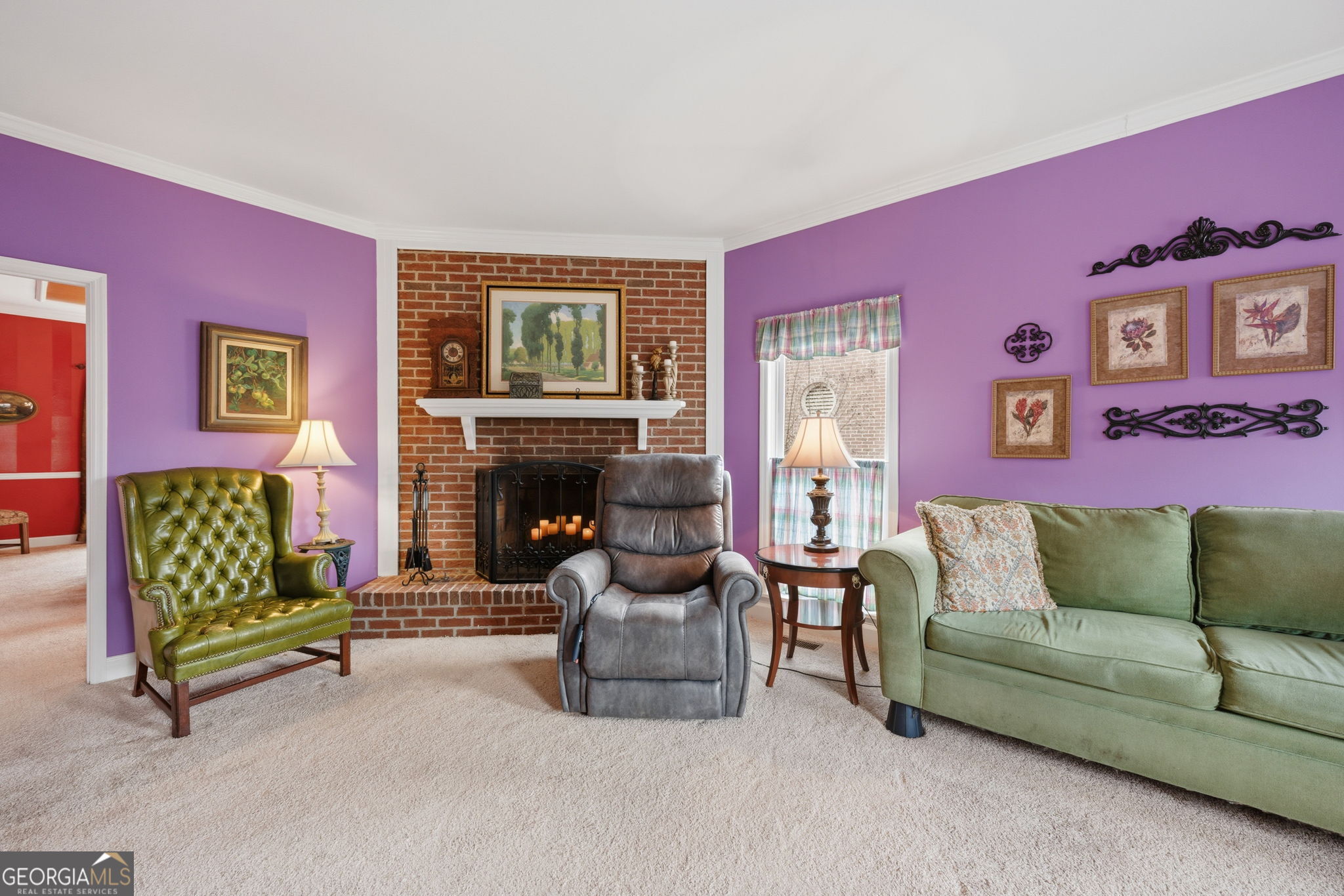 1391 Briarcliff Road, Unit 4B Macon, GA 31211 - Photo 19 of 42 a living room with furniture and a fireplace