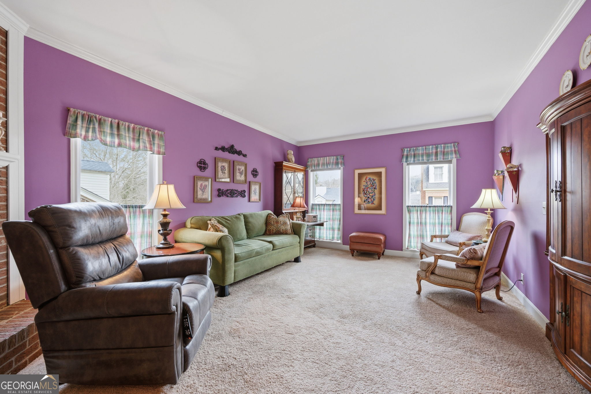 1391 Briarcliff Road, Unit 4B Macon, GA 31211 - Photo 20 of 42 a living room with furniture and a flat screen tv