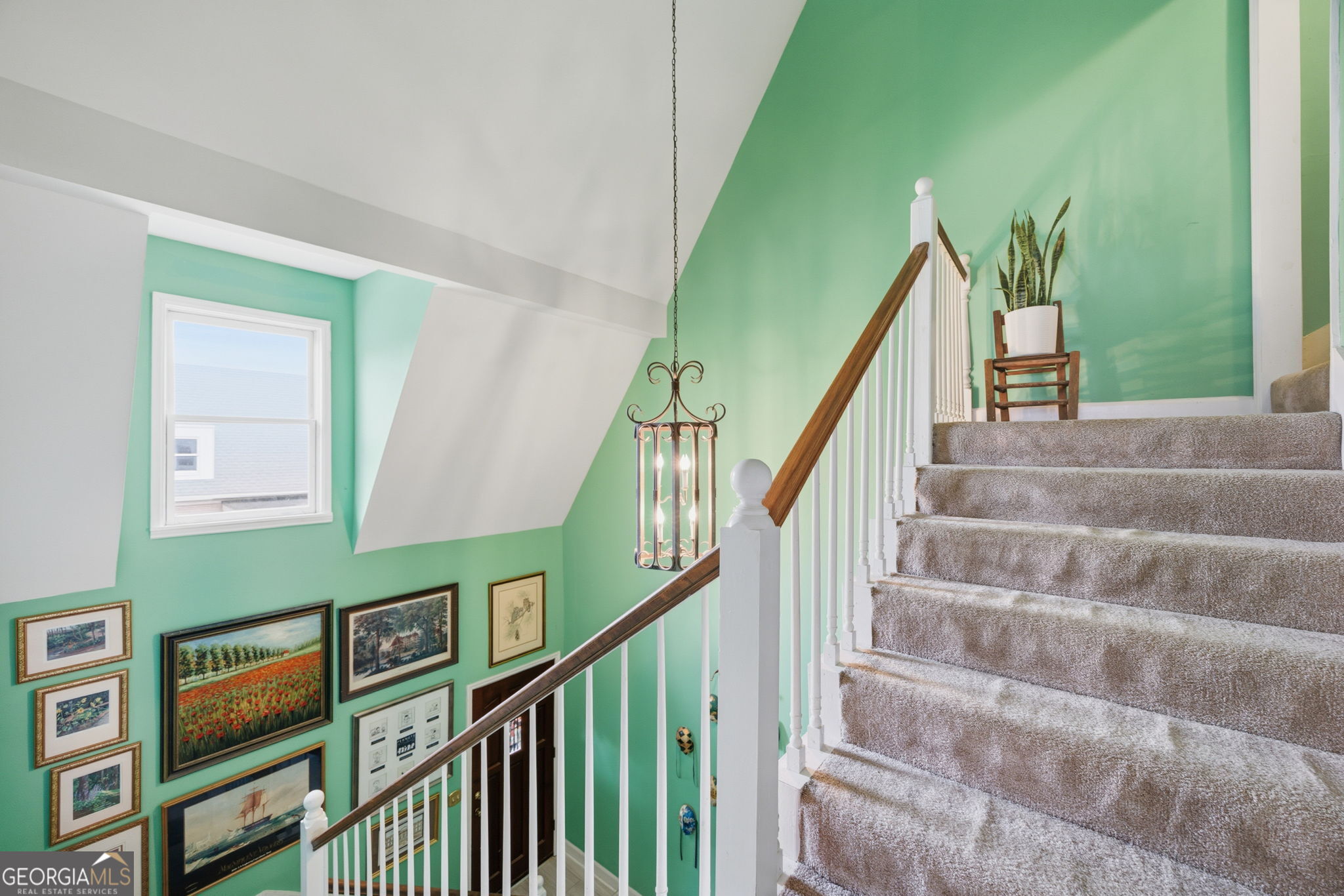 1391 Briarcliff Road, Unit 4B Macon, GA 31211 - Photo 23 of 42 a view of entryway and hall with wooden floor