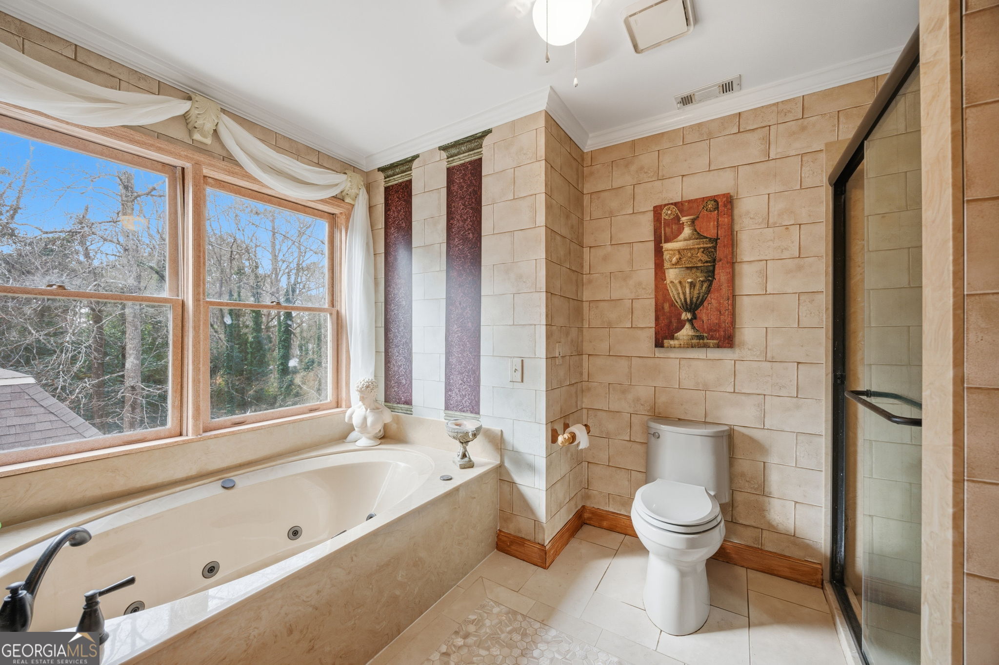 1391 Briarcliff Road, Unit 4B Macon, GA 31211 - Photo 32 of 42 a bathroom with a toilet sink and tub