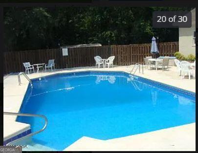 1391 Briarcliff Road, Unit 4B Macon, GA 31211 - Photo 41 of 42 a view of swimming pool with furniture