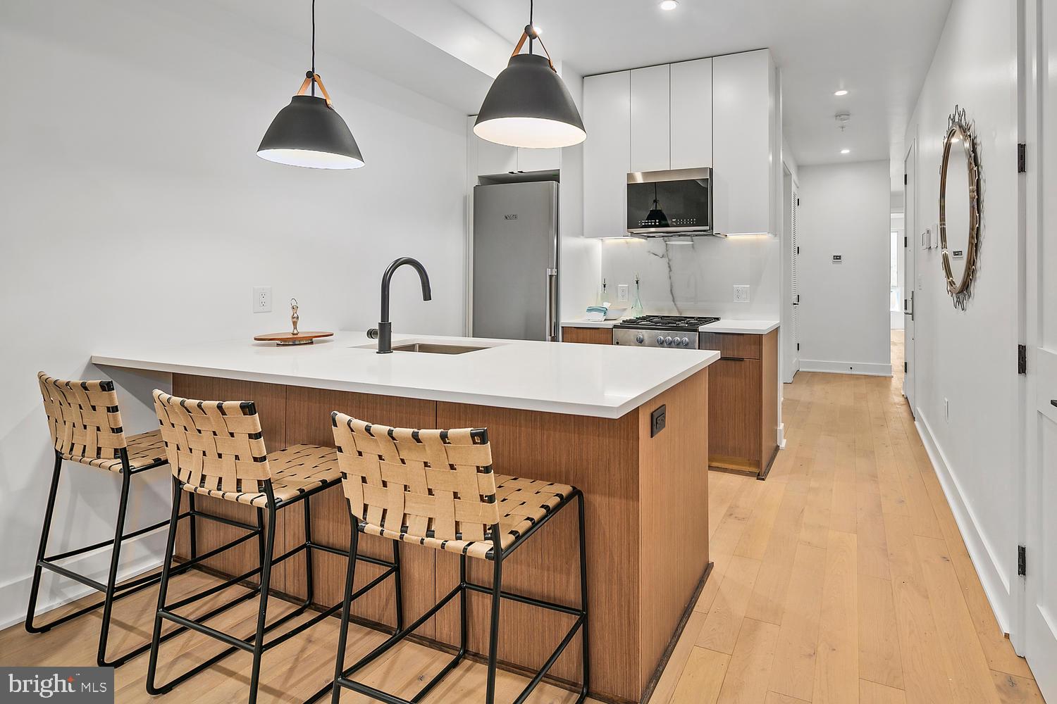 1316 8th Street Northwest, Unit 1 Washington, DC 20001 - Photo 2 of 25 Modern kitchen with breakfast bar