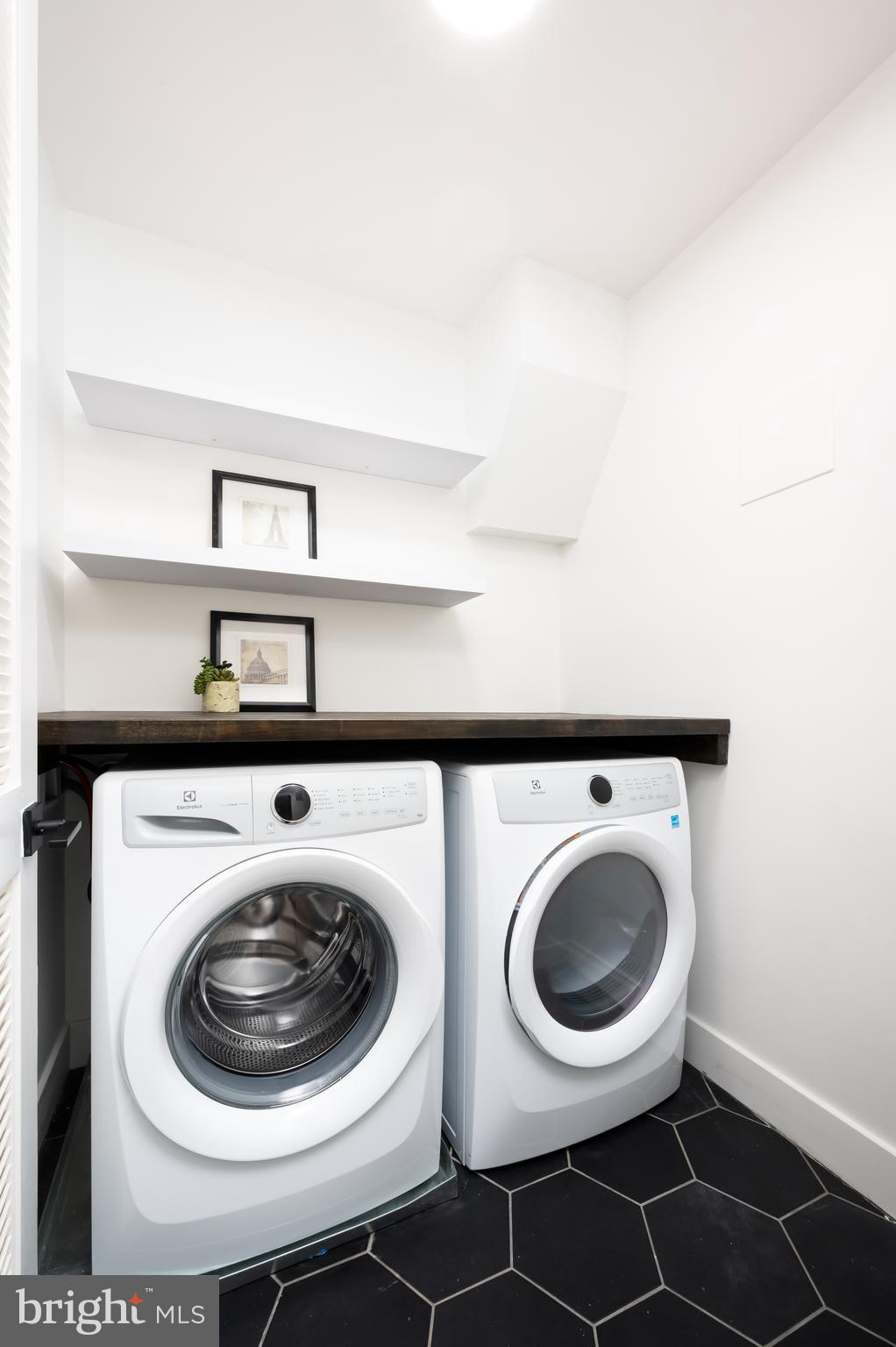 1316 8th Street Northwest, Unit 1 Washington, DC 20001 - Photo 11 of 25 Laundry room with floating shelves
