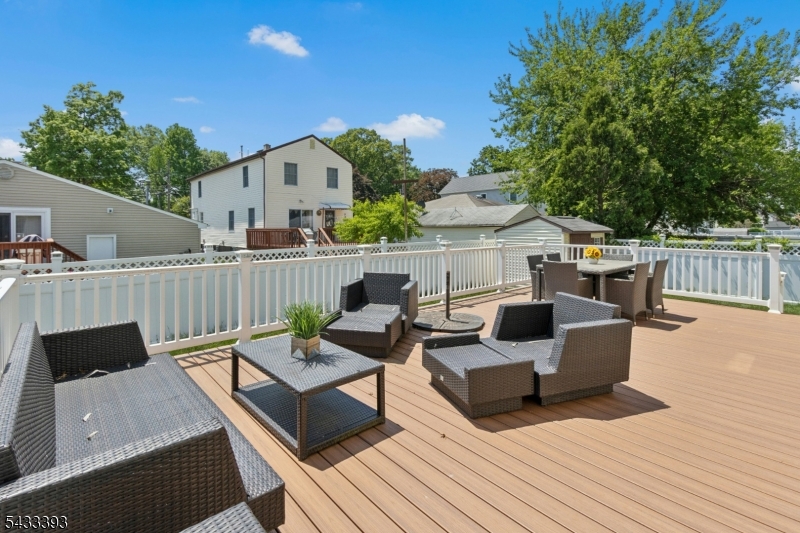 33 Stanton Street Clark, NJ 07066 - Photo 32 of 37 a view of a roof deck with couches