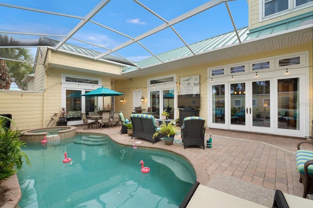 4606 Oak Hammock Court, Unit 4606 Ponce Inlet, FL 32127 - Photo 12 of 92 a view of swimming pool with seating space