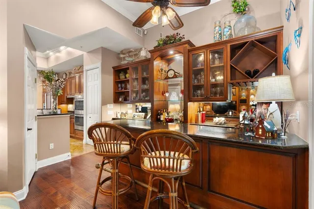 a bedroom with a bed and flat screen tv