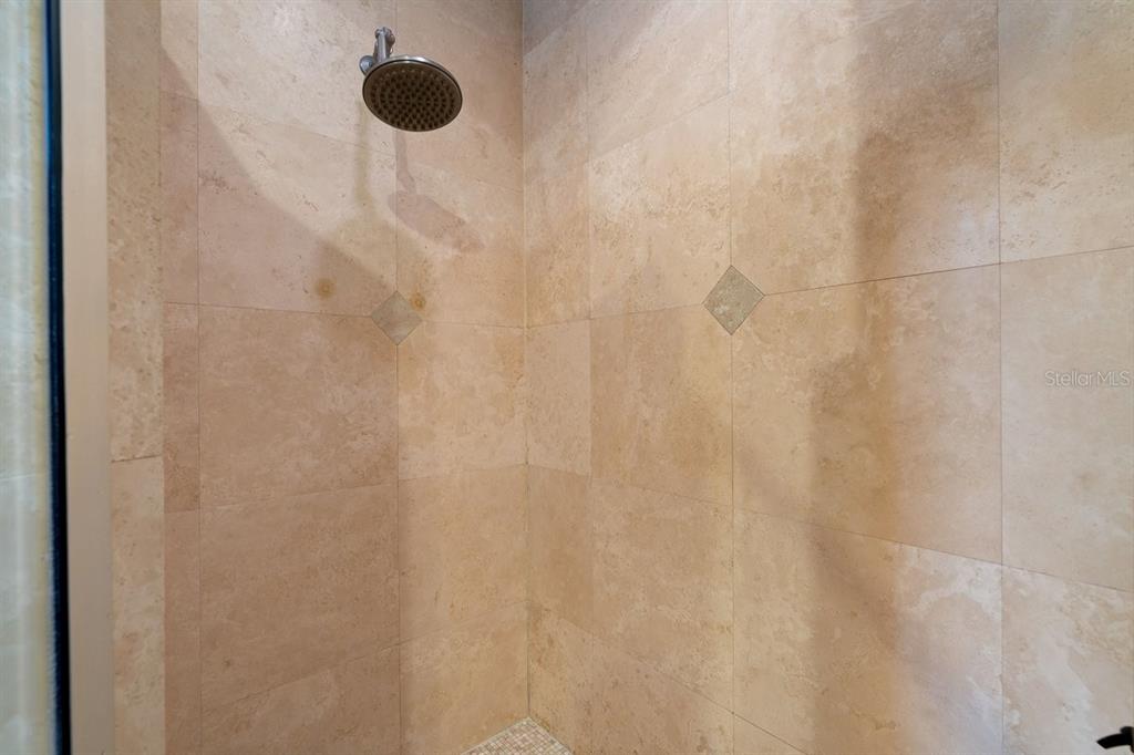 4606 Oak Hammock Court, Unit 4606 Ponce Inlet, FL 32127 - Photo 38 of 92 a close up of a shower curtain