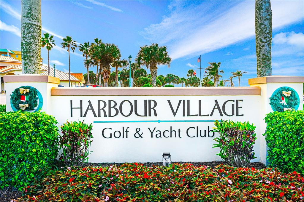 4606 Oak Hammock Court, Unit 4606 Ponce Inlet, FL 32127 - Photo 65 of 92 a sign on the side of a building