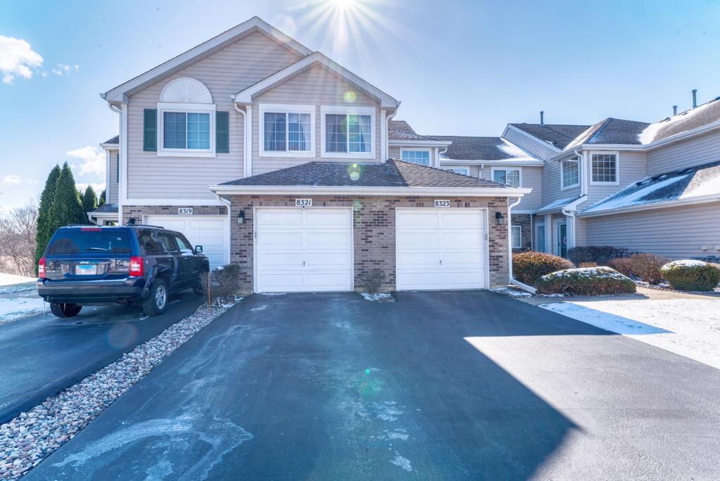 8321 Ripple Ridge Darien, IL 60561 - Photo 27 of 27 a front view of a house with a garage