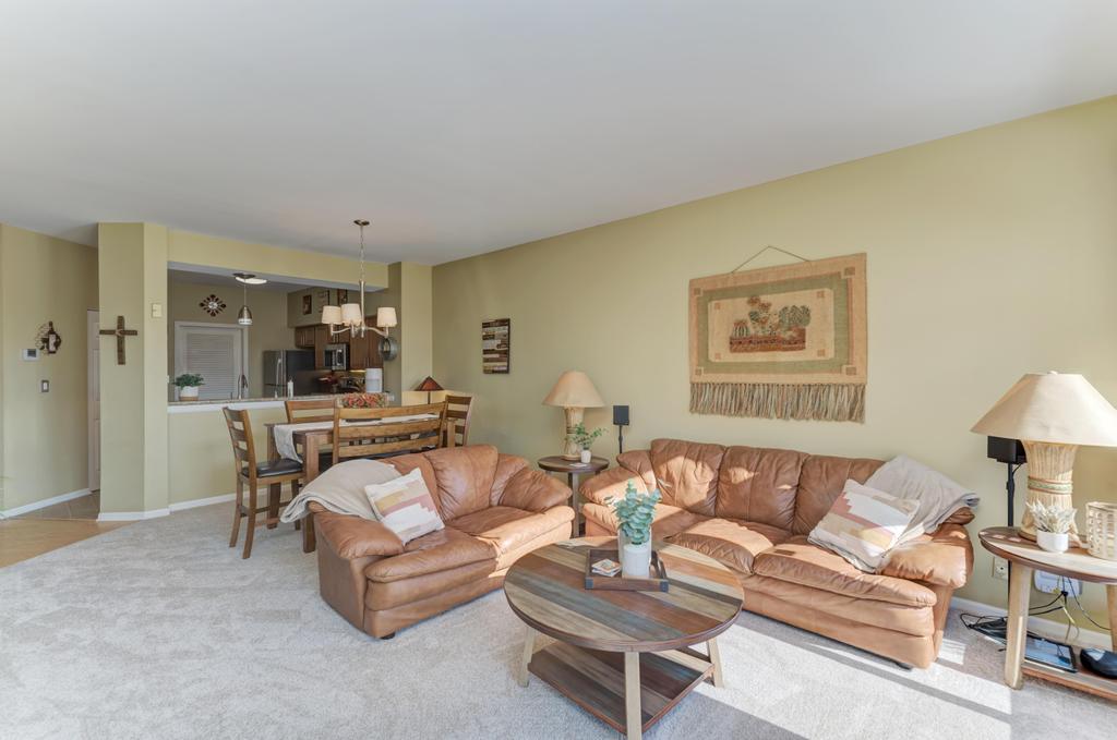 8321 Ripple Ridge Darien, IL 60561 - Photo 7 of 27 a living room with furniture and a table