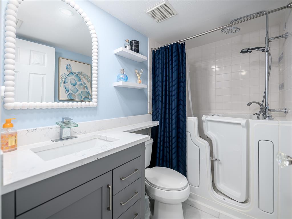 120 Caryl Way Oldsmar, FL 34677 - Photo 12 of 25 a bathroom with a sink toilet and shower