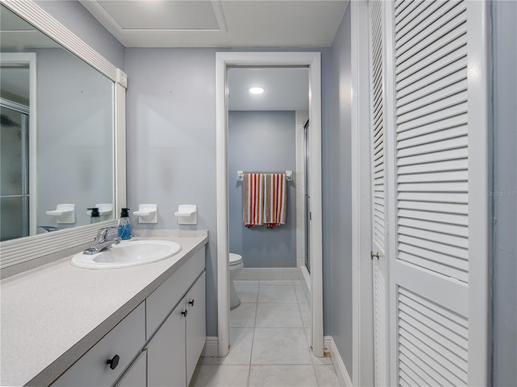 120 Caryl Way Oldsmar, FL 34677 - Photo 15 of 25 a bathroom with a sink and a mirror