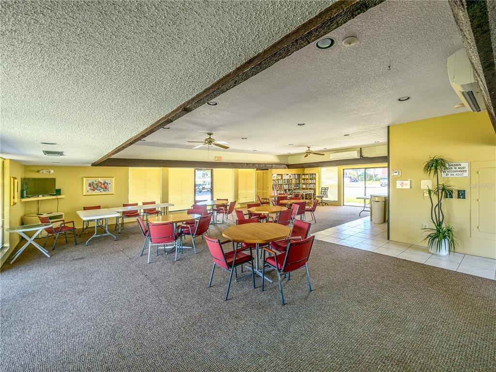 120 Caryl Way Oldsmar, FL 34677 - Photo 19 of 25 a living room with furniture and a large window