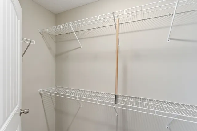 a view of a room with racks on the wall