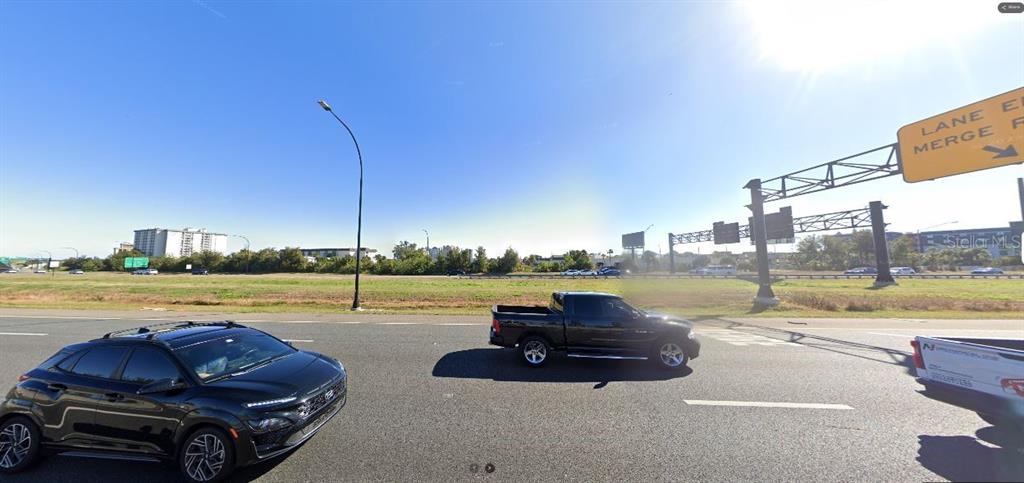 I-4 Davenport, FL 33897 - Photo 2 of 2 a view of swimming pool and lake view