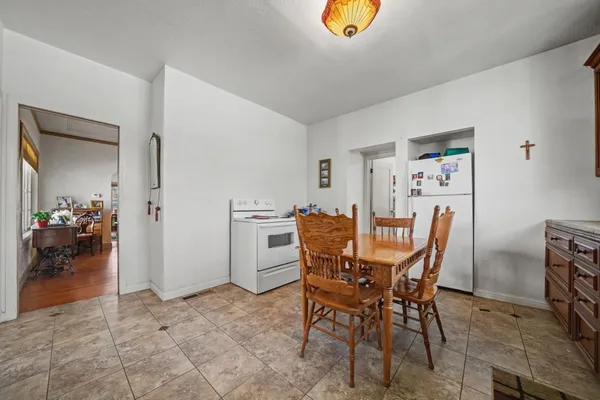 a view of a dining room with furniture