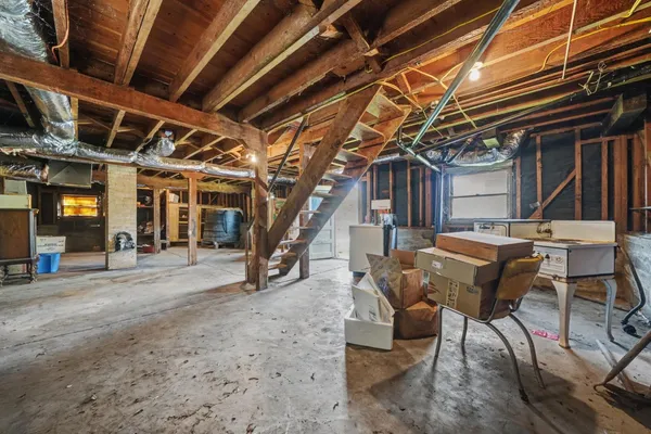 a view of a backyard with table and chairs with wooden floor