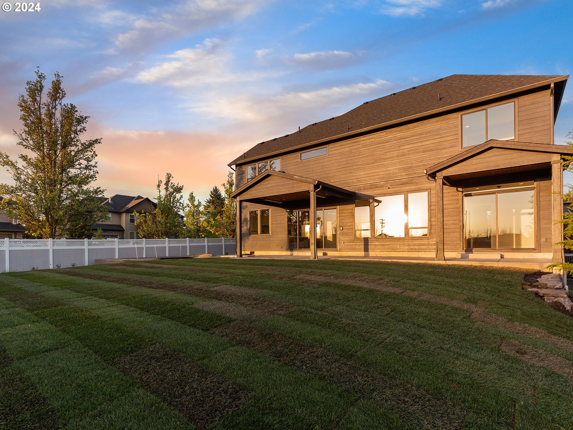 2115 South 19th Way Ridgefield, WA 98642 - Photo 26 of 26 a front view of a house with a garden