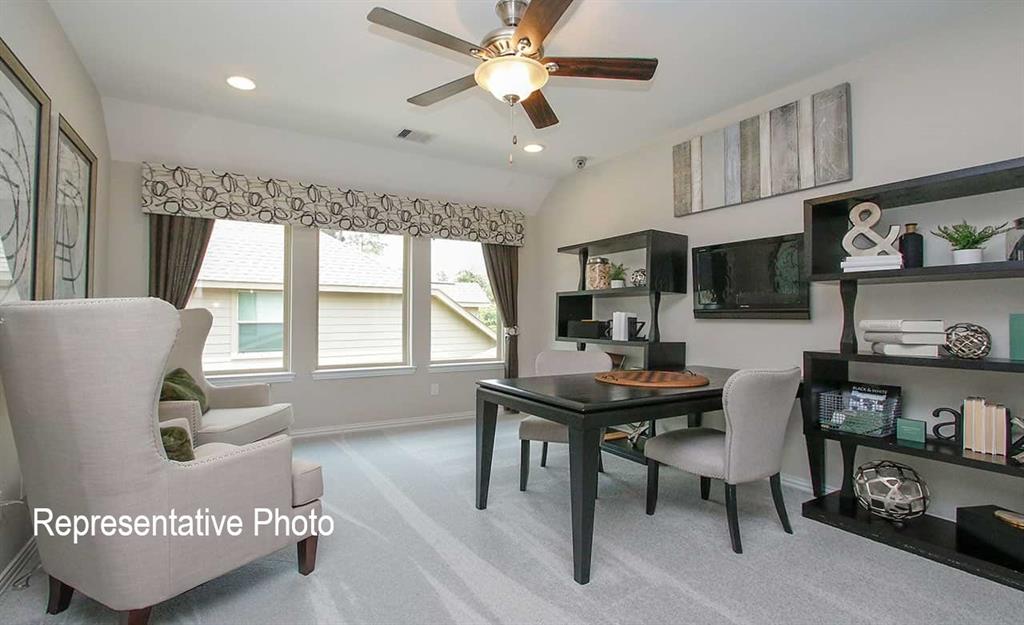 2845 Taylor Trail Corinth, TX 76210 - Photo 14 of 14 Spacious room featuring light-colored carpeting, recessed lighting, and a ceiling fan with integrated light fixture