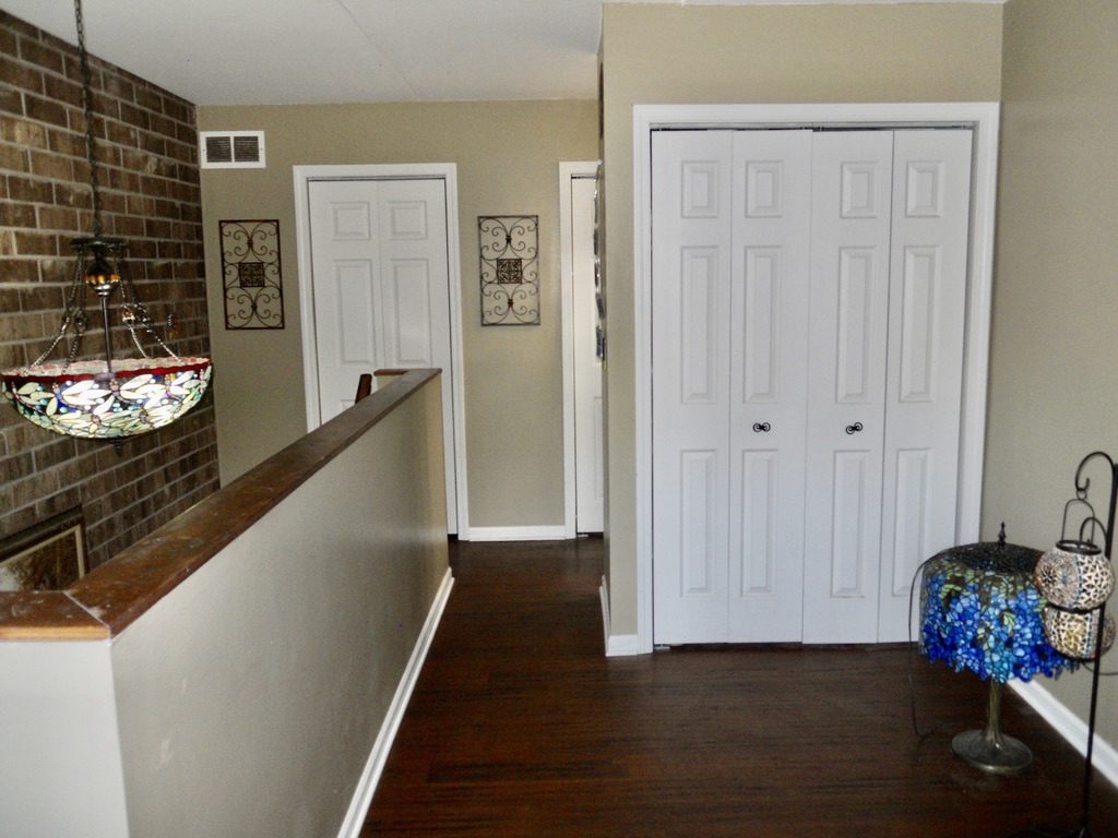 108 Kenneth Circle Elgin, IL 60120 - Photo 12 of 28 a view of an entryway with wooden floor