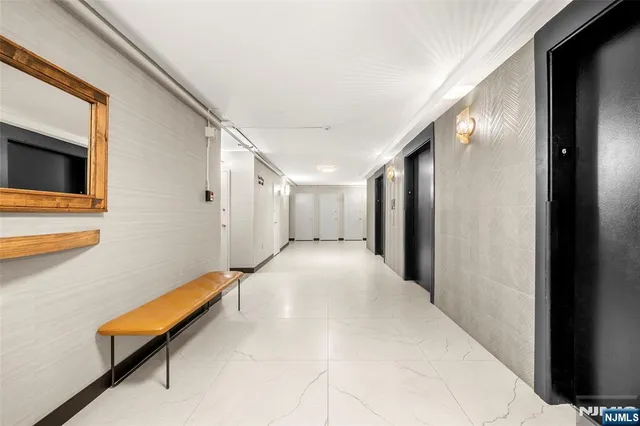 a view of a living room and entry way