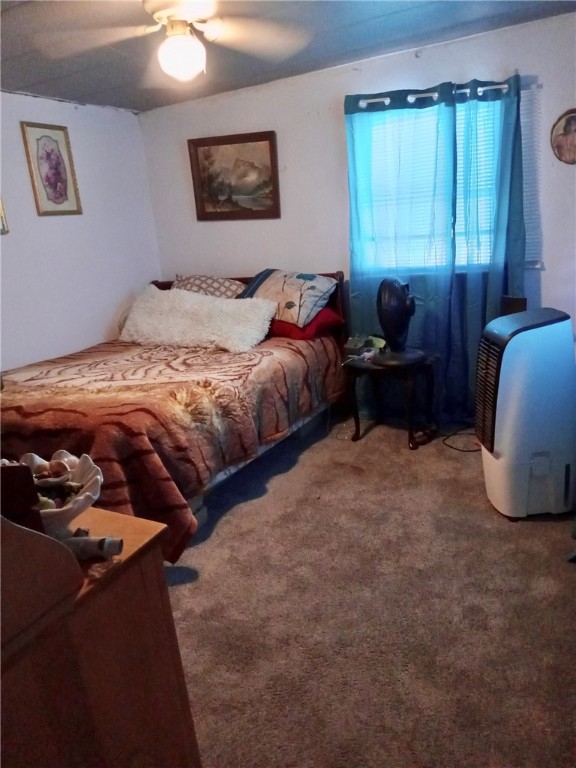 5237 North Double A Rnch Road Williams, AZ 86046 - Photo 3 of 8 a bedroom with bed and window