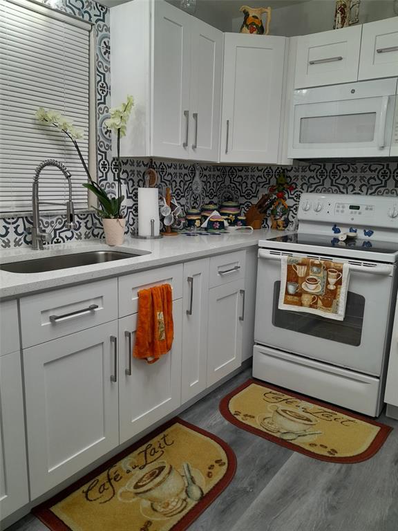 50 Larch Run Ocala, FL 34480 - Photo 6 of 12 a bathroom with a granite countertop sink and a mirror