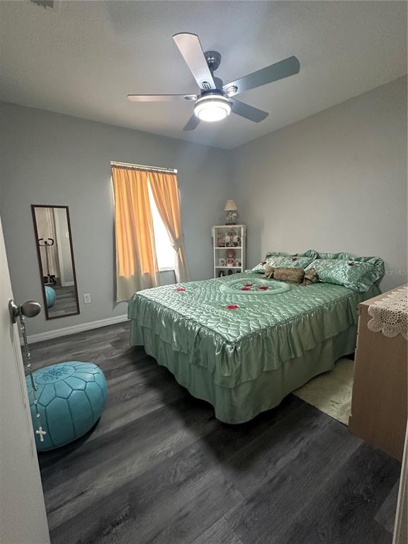 50 Larch Run Ocala, FL 34480 - Photo 10 of 12 a bedroom with a bed and window