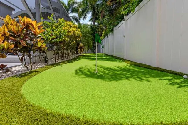 a bedroom with a large bed and a large window