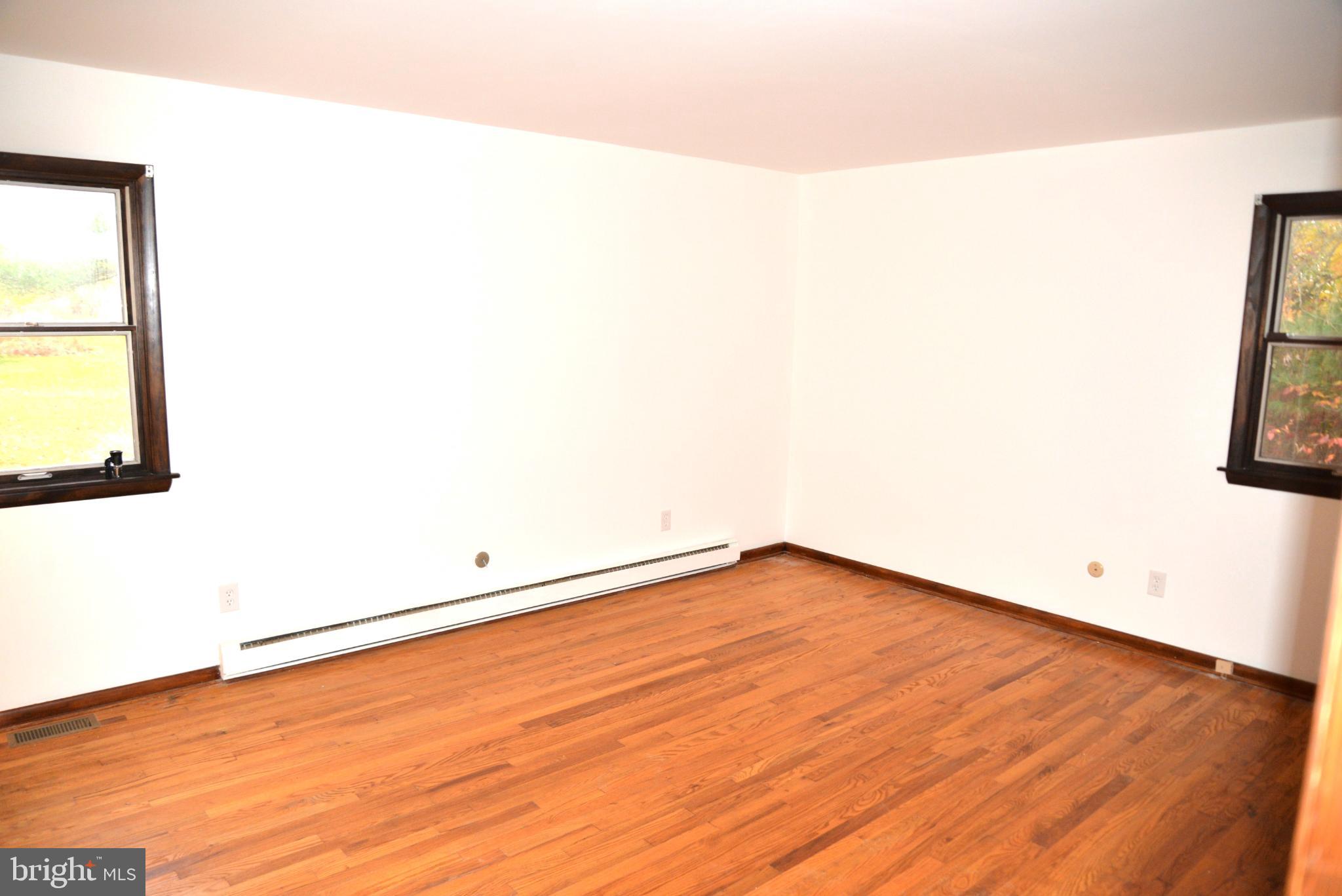 208 Faggs Manor Road Cochranville, PA 19330 - Photo 26 of 35 Spacious room with natural light and charm.