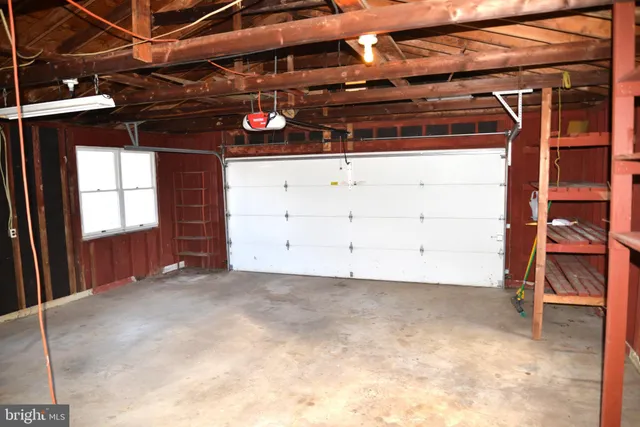 a view of room with garage