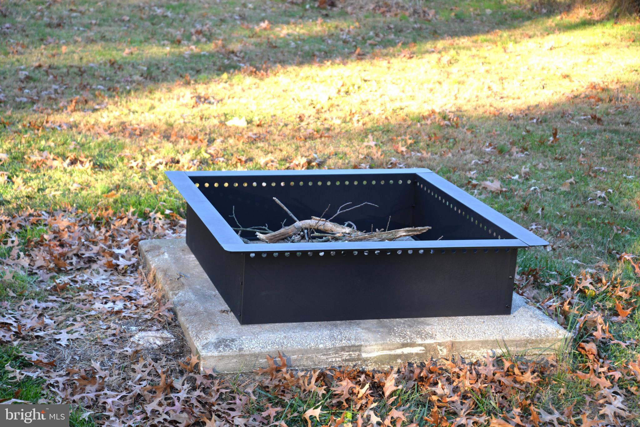208 Faggs Manor Road Cochranville, PA 19330 - Photo 8 of 35 Cozy fire pit ready for autumn evenings.