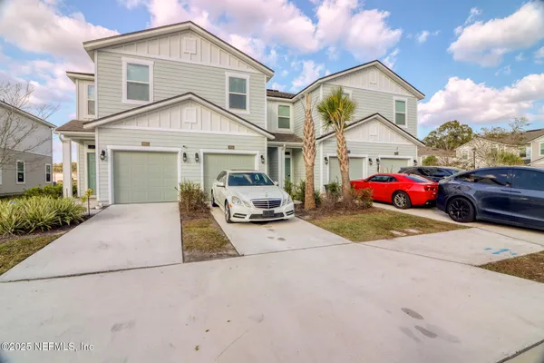 a parked cars parked in front of a house
