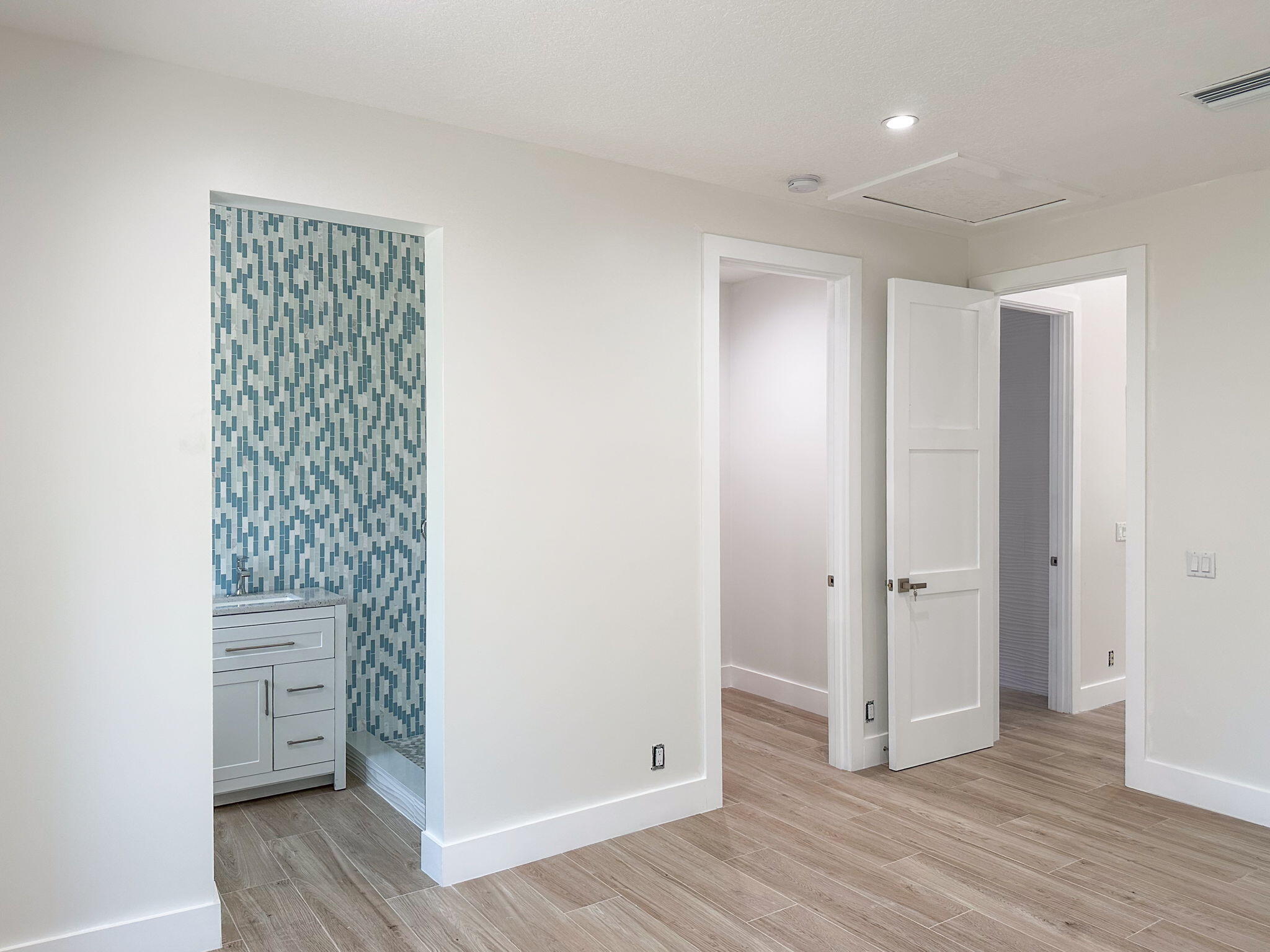 9576 171st Street North Jupiter, FL 33478 - Photo 12 of 36 a view of room with wooden floor