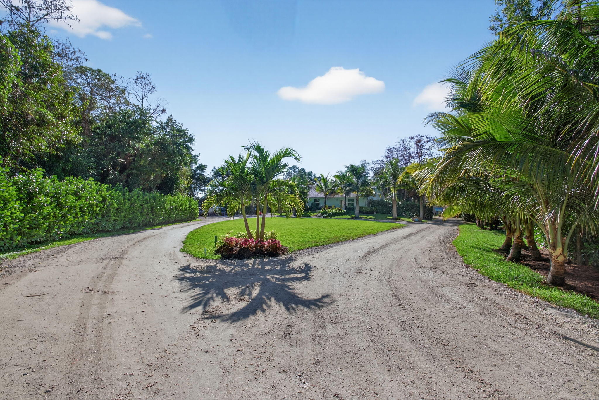 9576 171st Street North Jupiter, FL 33478 - Photo 16 of 36 a view of a backyard with swimming pool