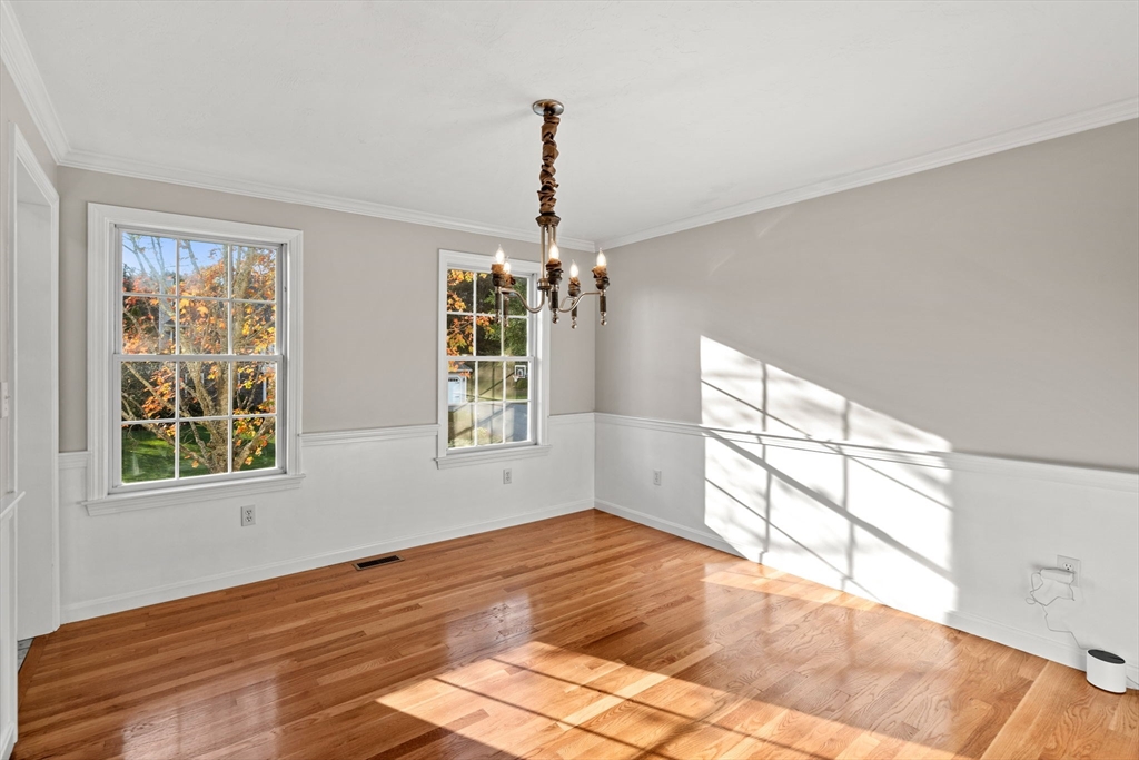23 Morrison Lane Westford, MA 01886 - Photo 12 of 37 a view of empty room with wooden floor and fan