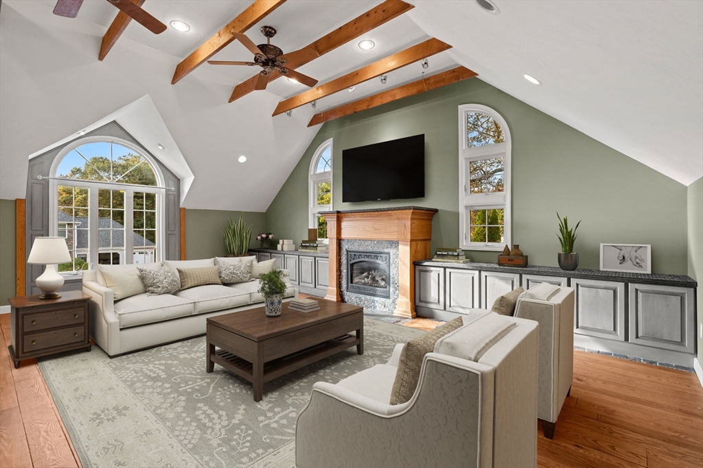 23 Morrison Lane Westford, MA 01886 - Photo 16 of 37 a living room with fireplace furniture and a flat screen tv