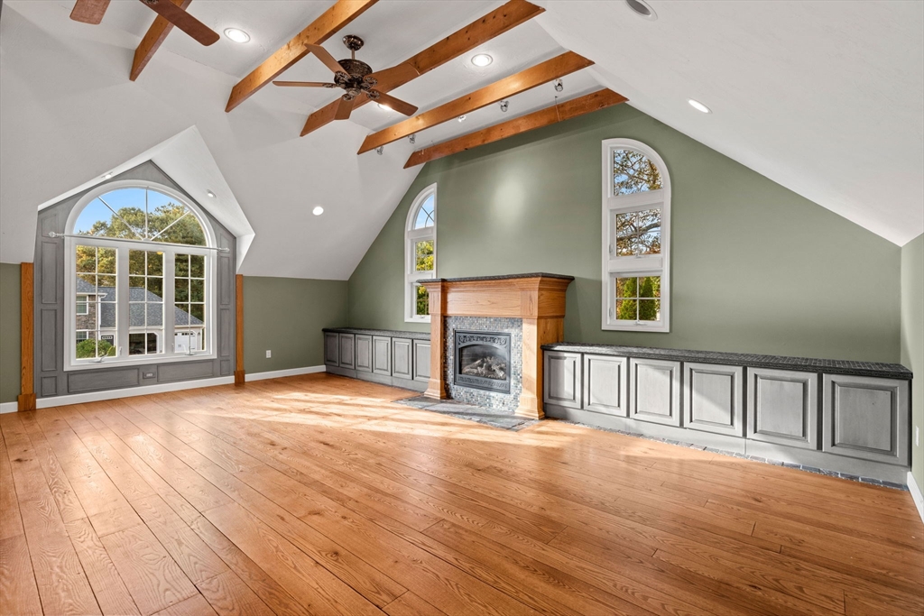 23 Morrison Lane Westford, MA 01886 - Photo 17 of 37 a view of an empty room with wooden floor and a window