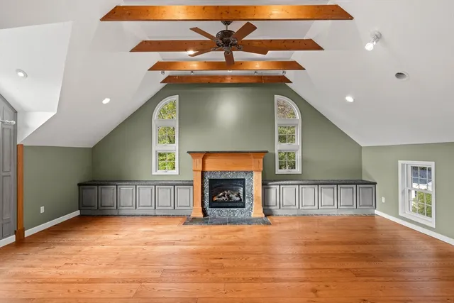 a view of a kitchen with a sink and a stove top oven