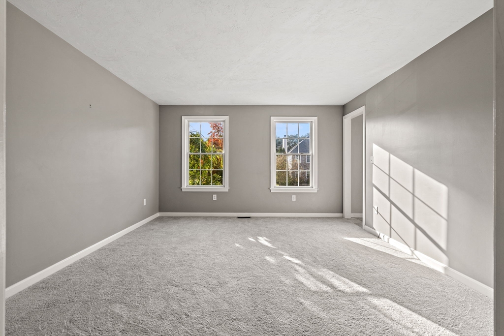23 Morrison Lane Westford, MA 01886 - Photo 23 of 37 an empty room with windows