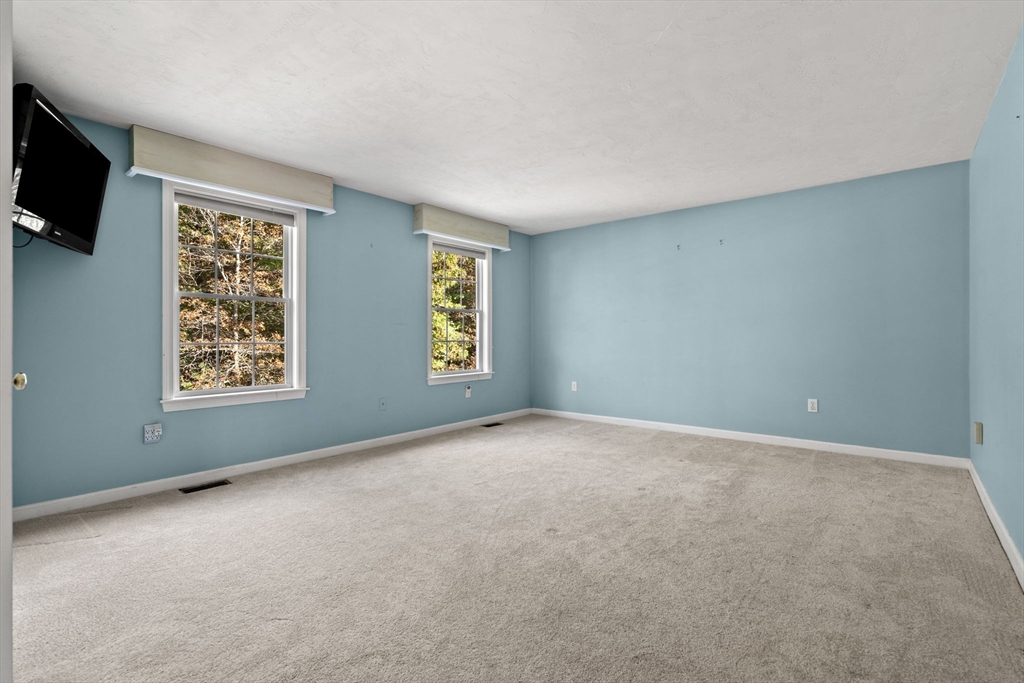 23 Morrison Lane Westford, MA 01886 - Photo 28 of 37 an empty room with windows