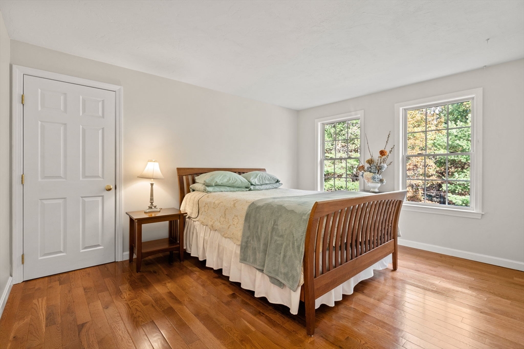 23 Morrison Lane Westford, MA 01886 - Photo 30 of 37 a bed room with a bed and window